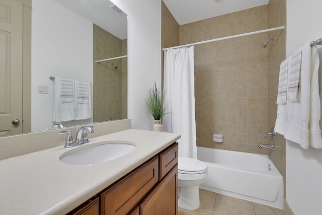 bathroom with tile patterned flooring, visible vents, toilet, shower / bath combo, and vanity