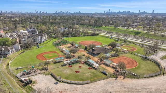 birds eye view of property featuring a city view