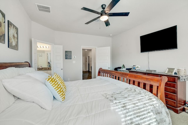 bedroom featuring visible vents, connected bathroom, and a ceiling fan