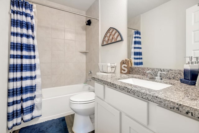 full bath with vanity, toilet, wood finished floors, and shower / bath combo with shower curtain