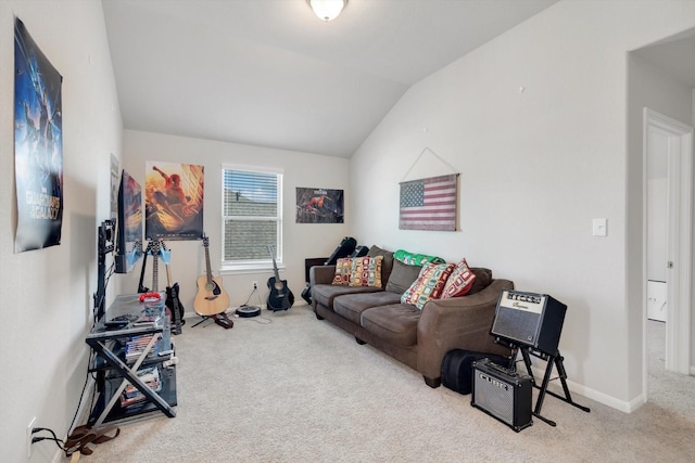 living area featuring baseboards, lofted ceiling, and carpet