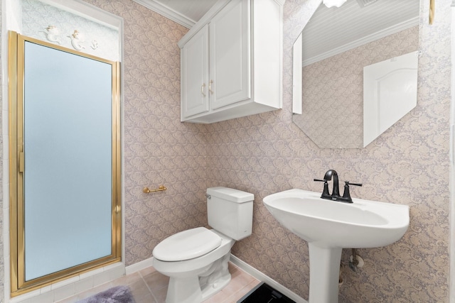 full bath featuring baseboards, tile patterned flooring, a shower stall, crown molding, and toilet