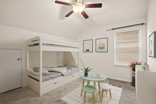 carpeted bedroom featuring ceiling fan and lofted ceiling