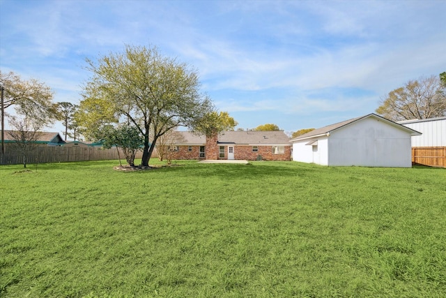 view of yard with fence