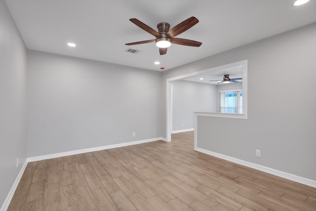 unfurnished room featuring recessed lighting, baseboards, light wood-style floors, and a ceiling fan