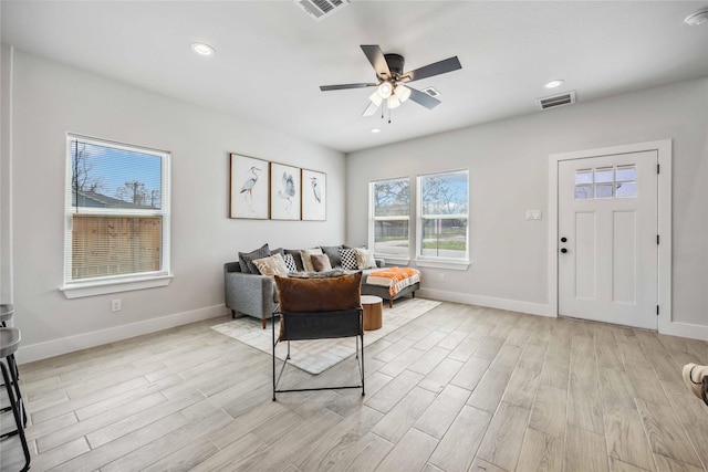 4715 Ward St, Houston, TX 77021 - living area with a ceiling fan, baseboards, light wood-type flooring, and recessed lighting