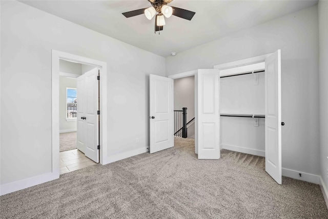 4715 Ward St, Houston, TX 77021 - unfurnished bedroom featuring carpet flooring, baseboards, a closet, and ceiling fan