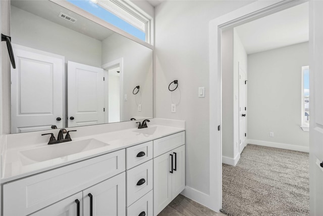 4715 Ward St, Houston, TX 77021 - bathroom with baseboards and double vanity