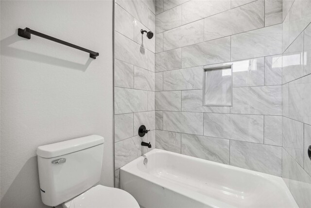 4715 Ward St, Houston, TX 77021 - bathroom featuring toilet and shower / washtub combination