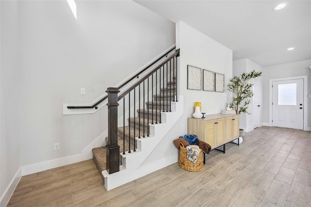 4715 Ward St, Houston, TX 77021 - foyer featuring baseboards, wood finished floors, recessed lighting, and stairway
