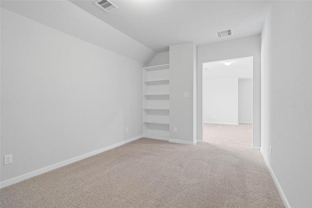 352 Spruce Oak Ln, Waller, TX 77484 - additional living space with built in features, light colored carpet, and baseboards