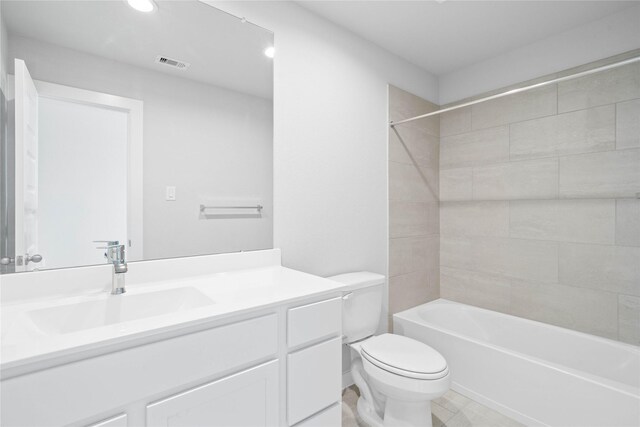 352 Spruce Oak Ln, Waller, TX 77484 - full bathroom featuring toilet, vanity, washtub / shower combination, recessed lighting, and tile patterned floors
