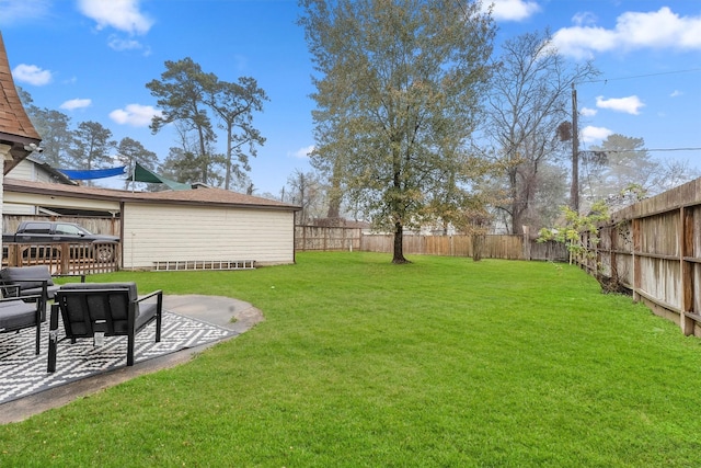 view of yard featuring a fenced backyard and a patio