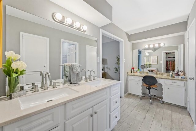 full bath with vanity and wood finished floors