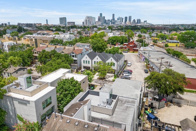 birds eye view of property with a city view