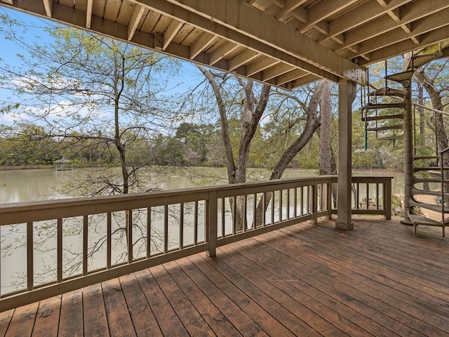 wooden terrace with a water view