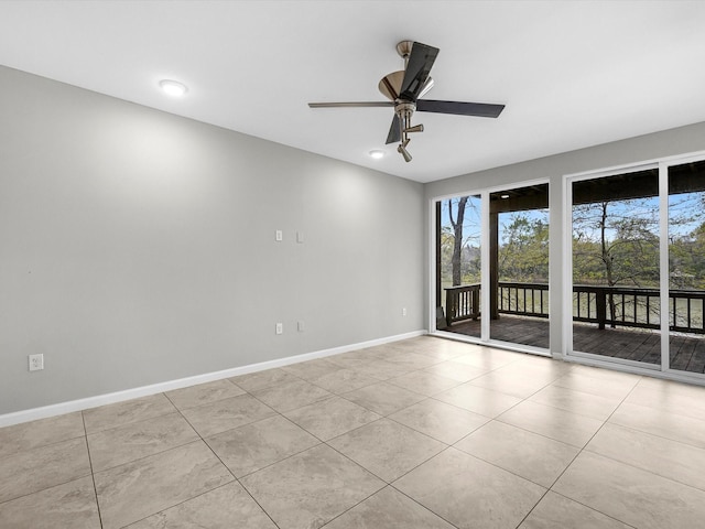 12658 Briar Patch Rd, Houston, TX 77077 - tiled empty room with baseboards, ceiling fan, and recessed lighting