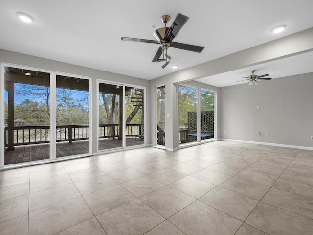 unfurnished room with tile patterned floors, baseboards, ceiling fan, and recessed lighting