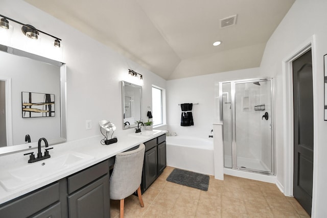 full bath featuring a sink, visible vents, a garden tub, and a shower stall