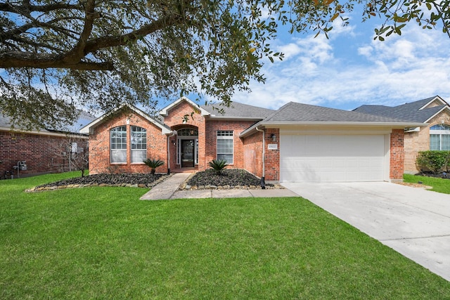 ranch-style house featuring concrete driveway, a garage, brick siding, and a front yard