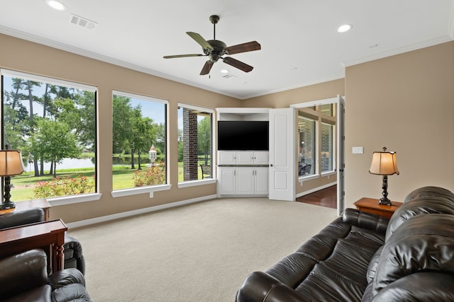 living area with crown molding, baseboards, carpet flooring, recessed lighting, and a ceiling fan