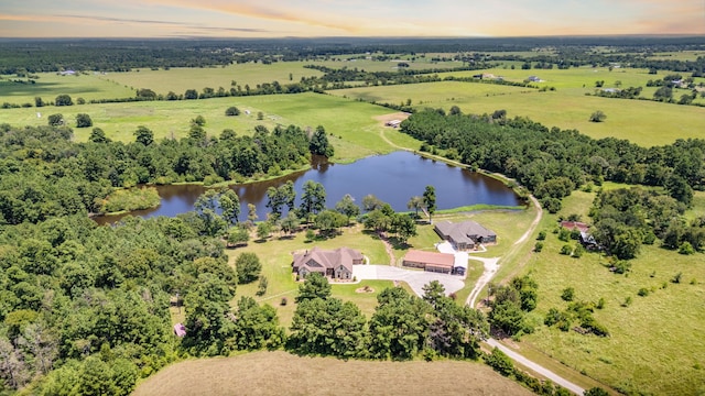 aerial view with a rural view and a water view