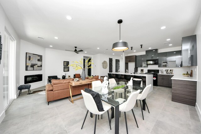 dining room with recessed lighting, visible vents, light tile patterned flooring, and a ceiling fan