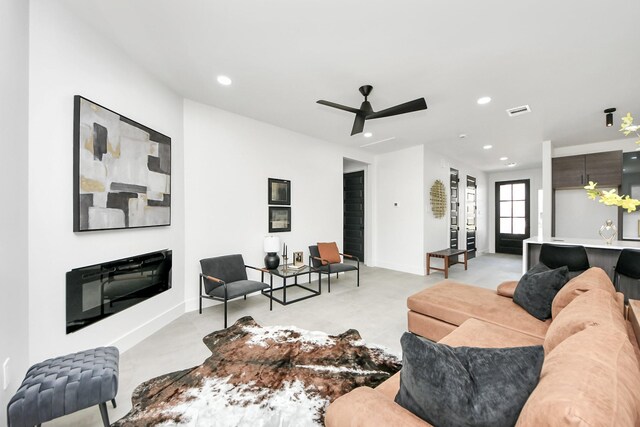 living room featuring recessed lighting, visible vents, and ceiling fan