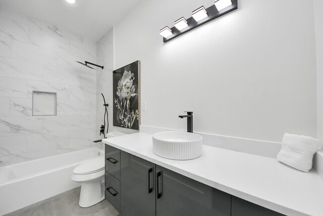 full bathroom featuring vanity, shower / bathing tub combination, and toilet