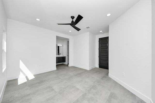 empty room featuring recessed lighting, visible vents, baseboards, and a ceiling fan