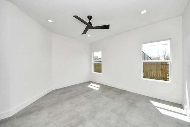 spare room featuring recessed lighting, baseboards, and ceiling fan