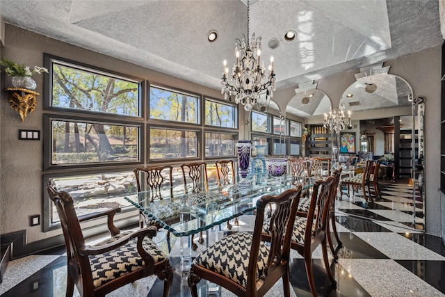 dining room with visible vents, a chandelier, recessed lighting, a textured wall, and a textured ceiling