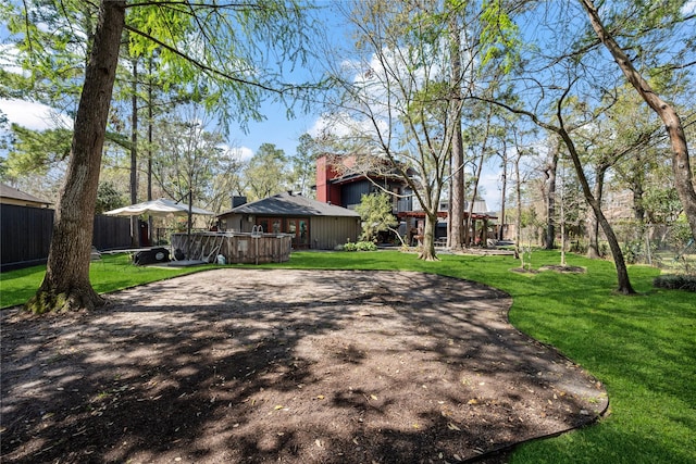 view of yard featuring fence