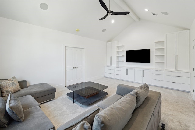 living area with visible vents, baseboards, beamed ceiling, light colored carpet, and a ceiling fan