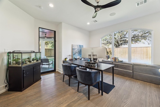 office space with ceiling fan, visible vents, wood finished floors, and recessed lighting