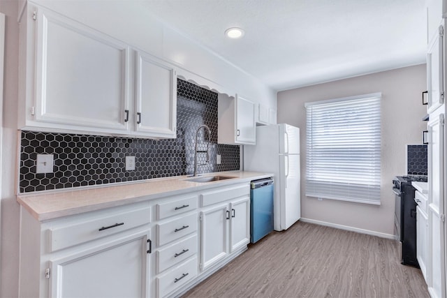 kitchen featuring a sink, black range with gas cooktop, white cabinets, decorative backsplash, and dishwasher