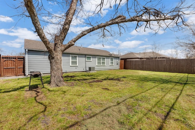 view of yard featuring cooling unit and a fenced backyard