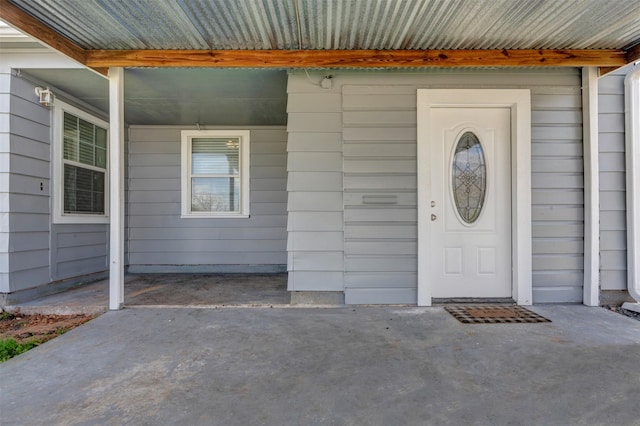 entrance to property with covered porch