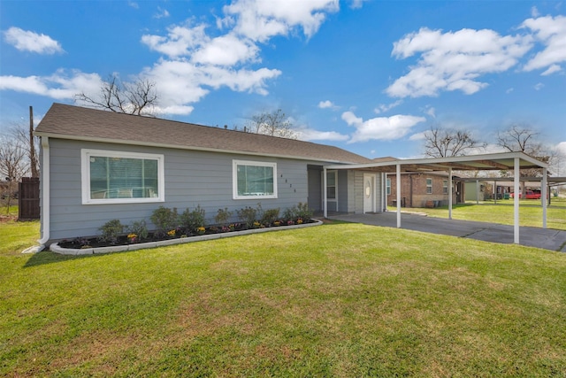 single story home featuring a carport and a front yard