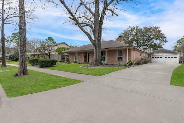 ranch-style house with a front lawn, concrete driveway, an attached garage, brick siding, and a chimney