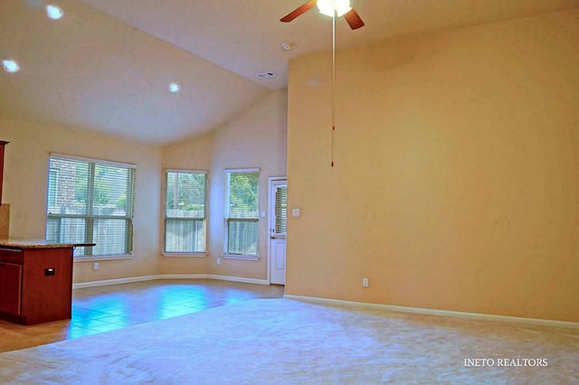 spare room featuring light tile patterned floors, baseboards, recessed lighting, ceiling fan, and light carpet