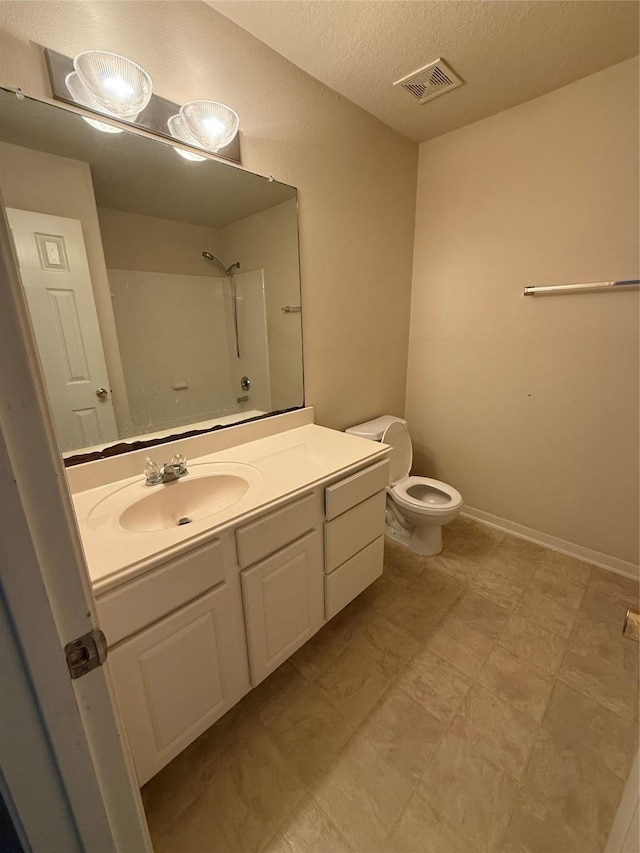 bathroom with visible vents, walk in shower, toilet, vanity, and a textured ceiling