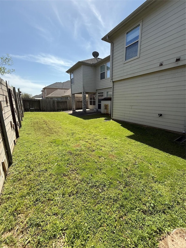 view of yard featuring a fenced backyard