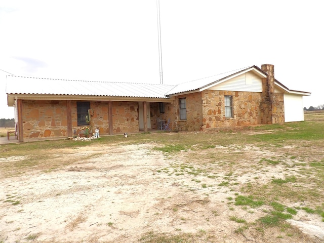 12830 Fm 1280, Lovelady, TX 75851 - view of front facade with stone siding and a chimney