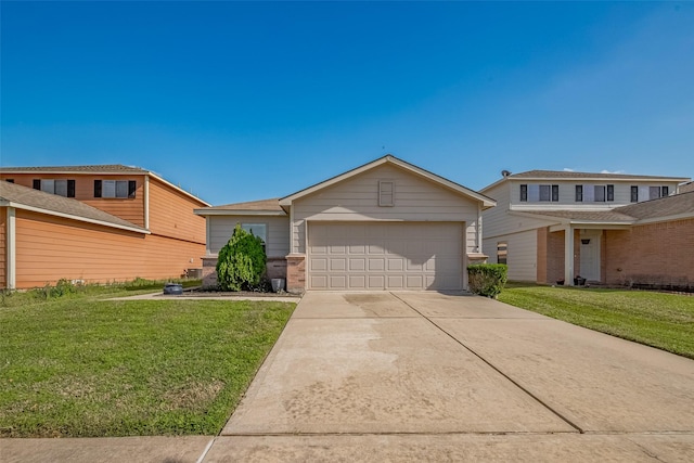 view of front of home featuring brick siding, a garage, driveway, and a front yard