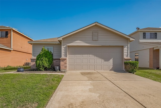 view of front of home with concrete driveway, an attached garage, brick siding, and a front lawn