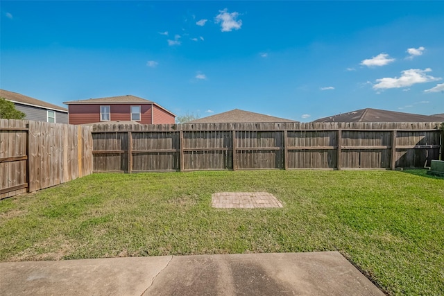 view of yard featuring a fenced backyard