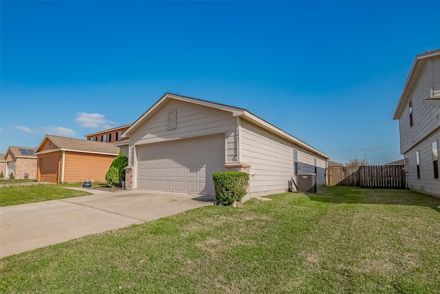 view of home's exterior featuring a garage, a lawn, central AC unit, and fence