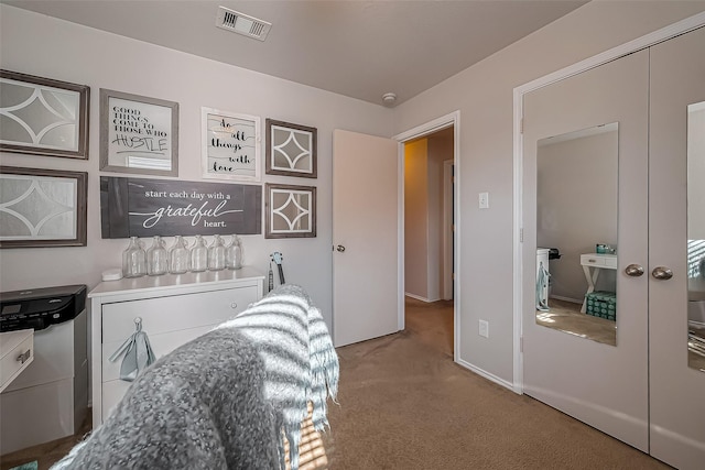 interior space with visible vents and baseboards