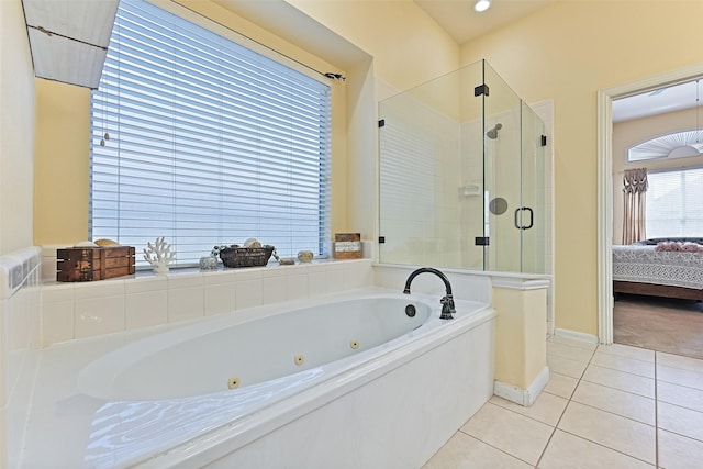 ensuite bathroom featuring baseboards, a stall shower, tile patterned flooring, a jetted tub, and connected bathroom